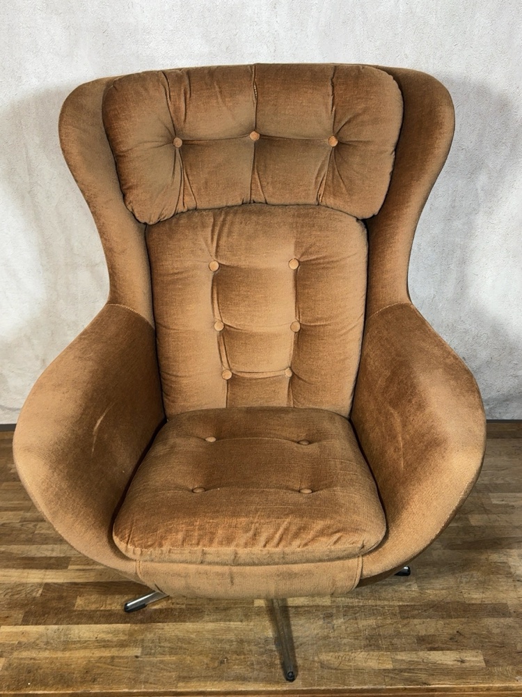 caramel corduroy swivel wingback lounge chair with button tufting
