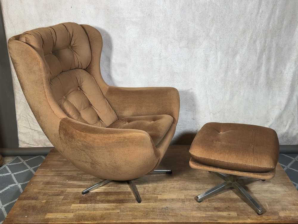 brown ribbed swivel wingback armchair with matching footstool