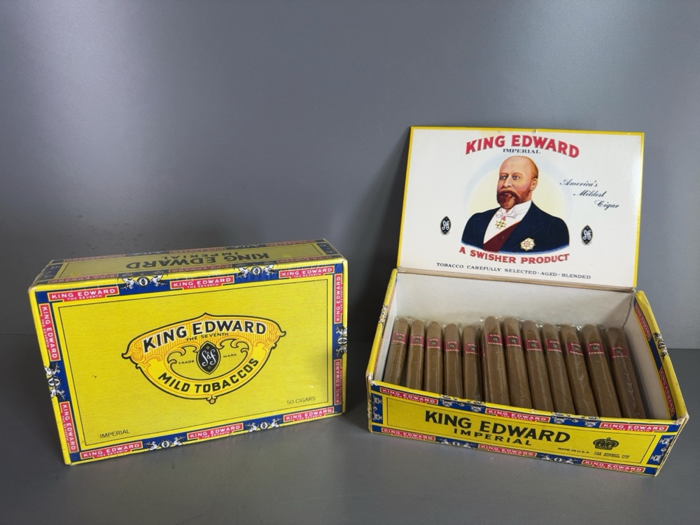 two yellow and blue boxes of King Edward Imperial cigars, one open